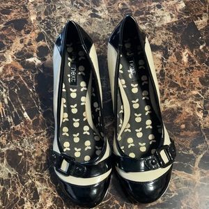 Black and cream faux patent leather heels